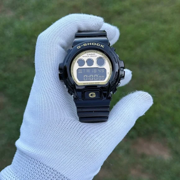 G-SHOCK Black and Gold Digital Watch men’s